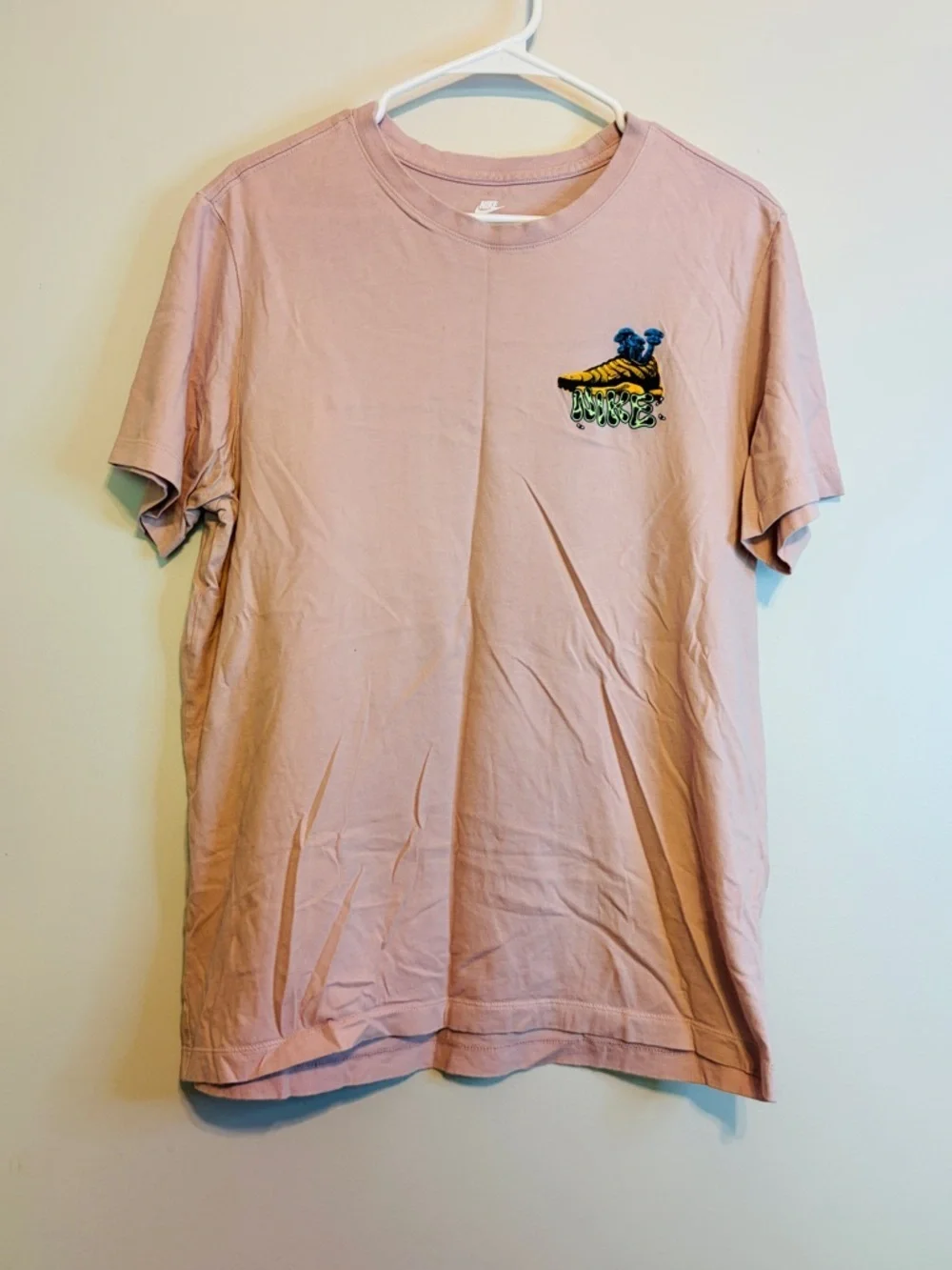 Nike Light Pink Short Sleeve Tee with Small Chest Graphic